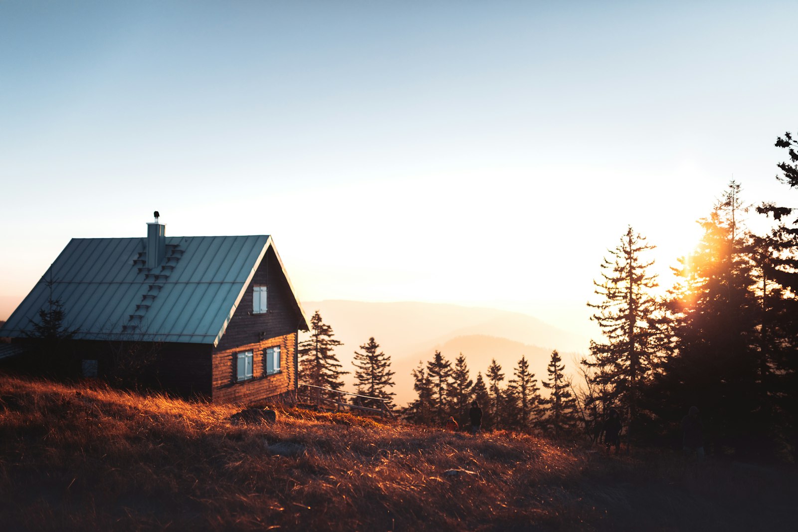 A wooden gabled heritage building at golden dusk (placeholder photo)